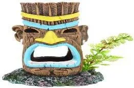 Resin aquarium ornament shaped as a carved Tiki-style totem head with a small artificial plant accent