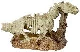 Resin aquarium ornament depicting a fossilized/skeletal dragon-like creature standing on a rock base