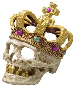 Resin aquarium ornament shaped as a human skull wearing a jeweled gold crown